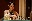 A woman plays chess, her focused expression highlighting the strategic depth of the game. blurred out low res